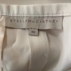 Stella McCartney Cream Coated Silk Button Detail Tapered Trousers S For Women 12 Stella McCartney Cream Coated Silk Button Detail Tapered Trousers S For Women -Stella McCartney Sales luxury women stella mccartney used clothes p285902 003
