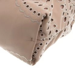 Stella McCartney Beige Faux Leather Eyelet Noma Bucket Bag For Women -Stella McCartney Sales luxury women stella mccartney used handbags p93577 011